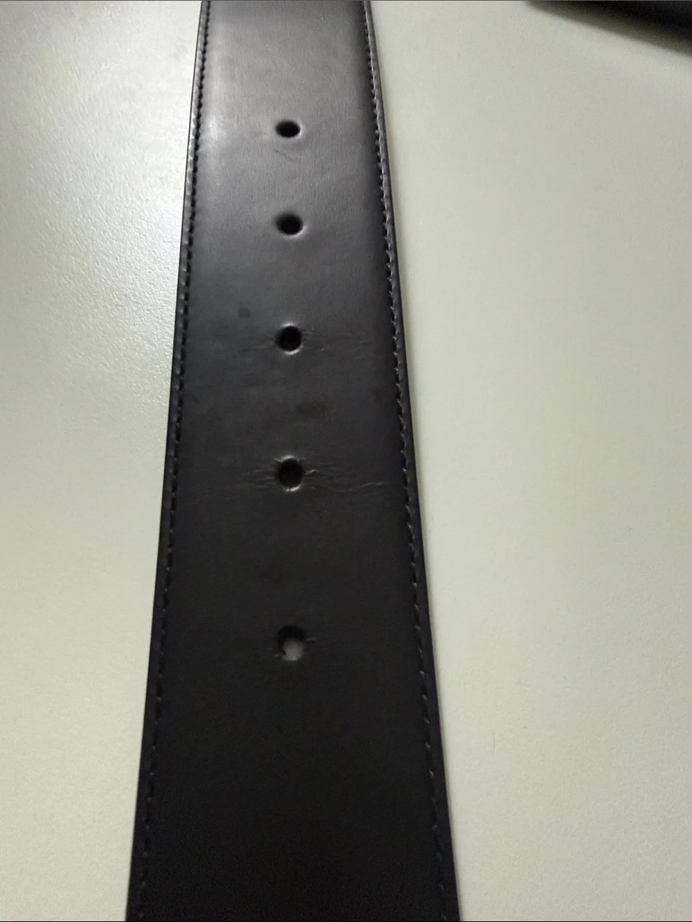 Salvatore Ferragamo Men's Black Leather Belt with Silver Buckle.